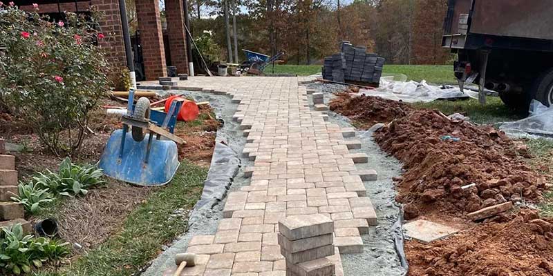 brick walkway under construction in a residential property in Kernersville, NC