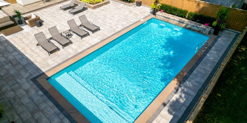 Install Concrete Pavers Around Your Pool